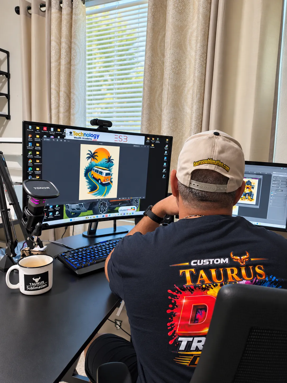 Hilario designing DTF artwork in the Taurus Sublimation studio