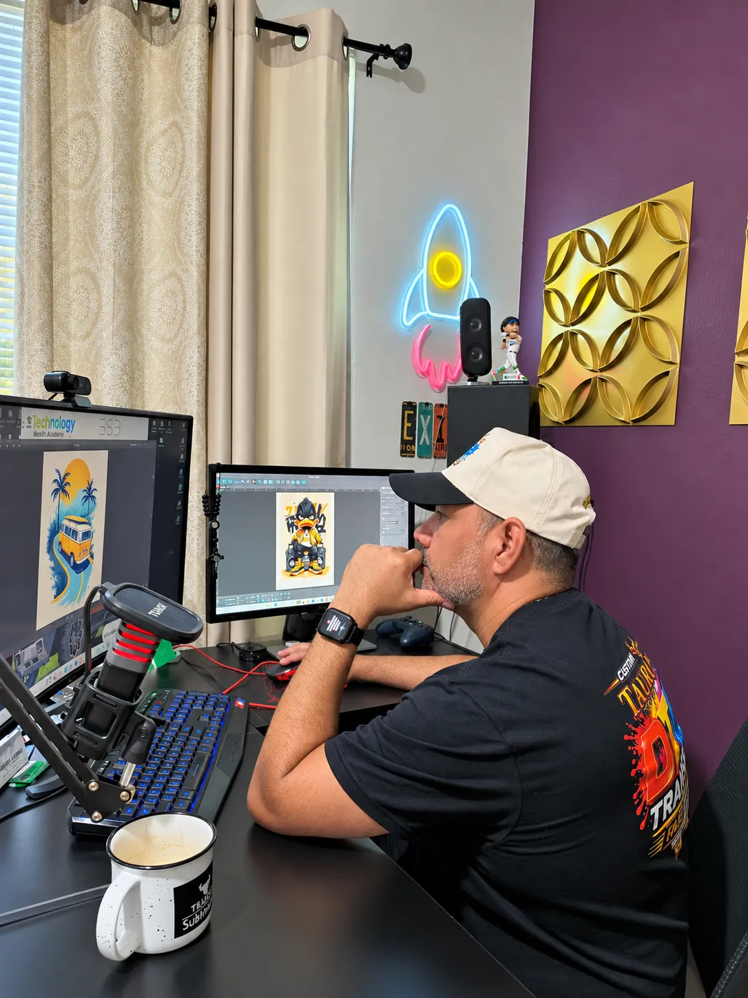 Hilario designing DTF artwork in the Taurus Sublimation studio
